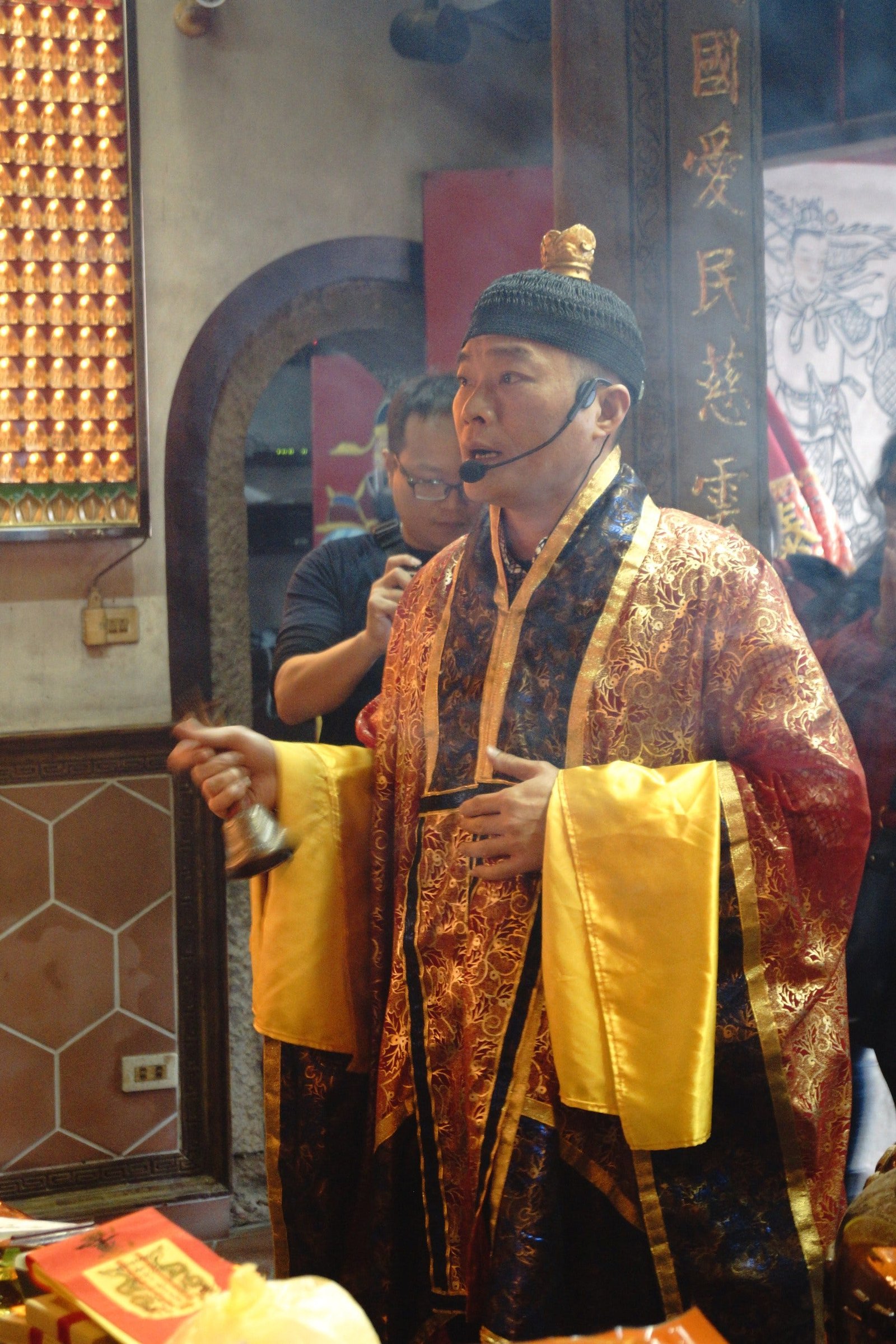 Taoist clergy at Shoushan Temple, Shuangxi, New Taipei. This is the kind of room the question gets asked in. Photo by shih-chen yang, CC BY-SA 2.0, via Wikimedia Commons.